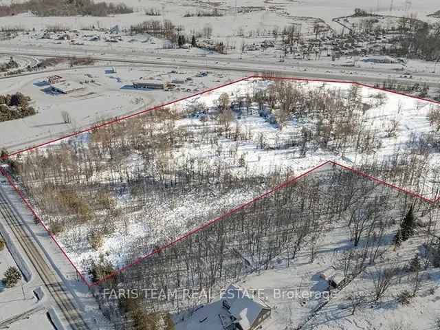 Highway 400 Investment Lot: Rural Zoning, High Visibility