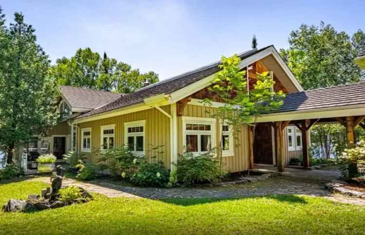 The West Coast Meets North Bay at this Vast Waterfront Timber Frame