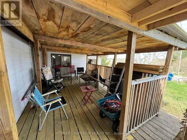 1 Bedroom Mobile Home on Large Lot with Garage - Needs Repairs