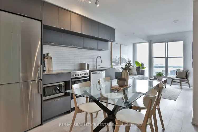 1 Bedroom Plus Den Suite City Lake Views Modern Kitchen