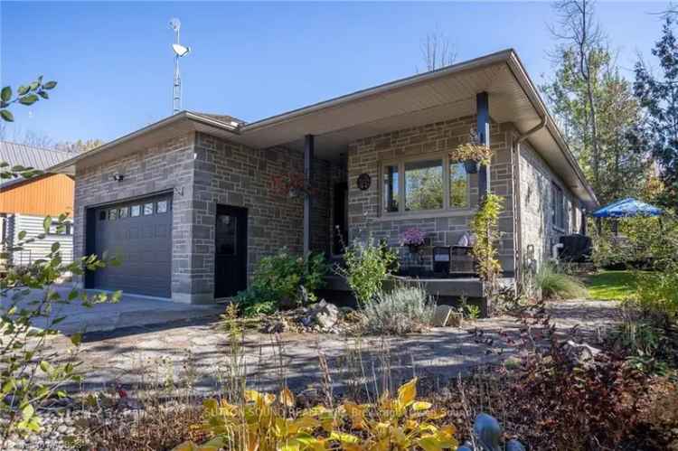 Buy Bungalow in Georgian Bluffs with Modern Updates and Tranquil Living