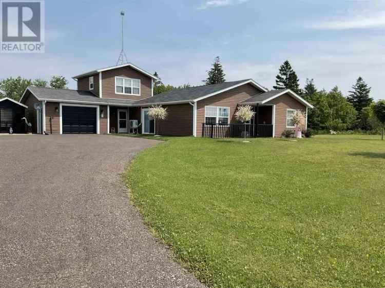 Spacious Furnished Home on 21.7 Acres with Detached Garage and Workshop