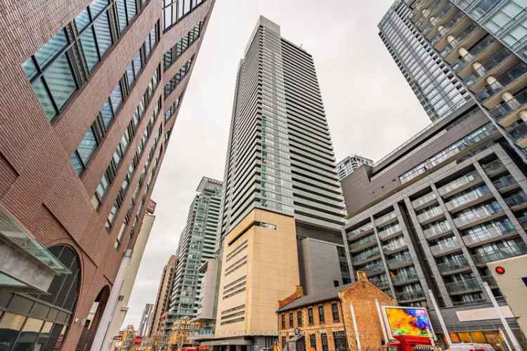 Luxury 1 Bedroom Plus Den at Festival Tower in Toronto Entertainment District