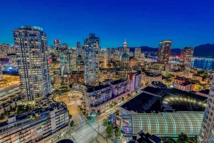 Buy Penthouse in Central Location with Roof Deck and Mountain Views