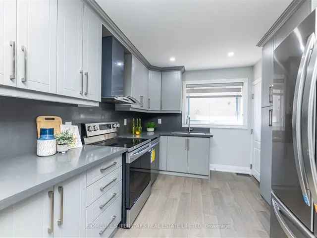 Renovated House with Legal Basement Apartment Near Amenities