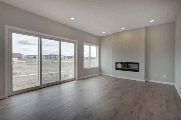 New 4-Bed Home in Creekstone of Pine Creek with Legal Basement Suite Potential