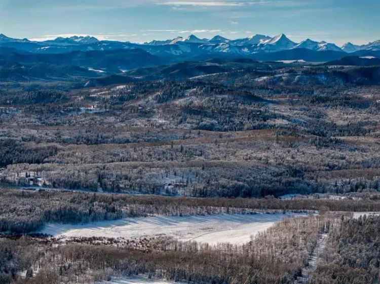 Buy House in Bragg Creek with Subdivision Potential and Crown Land Access