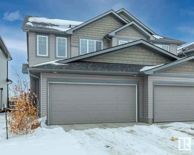 Stunning Half Duplex with Double Garage and Top-Tier Upgrades