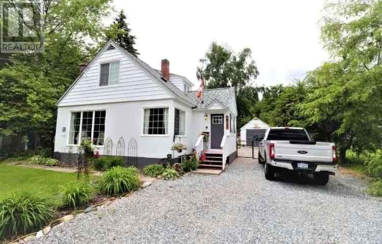 5 Bed 3 Bath Character Home in Castlegar with .67 Acre Lot and Pool