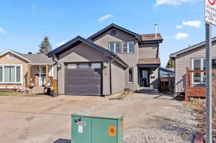 4 Bedroom Family Home in Thickwood with New Furnace and Laminate Flooring