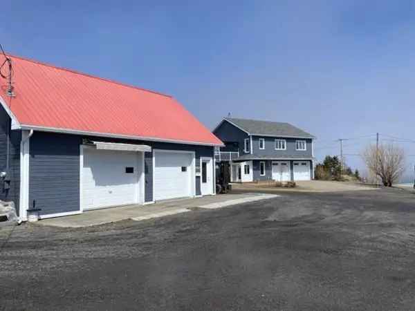 2+ Storey Home with River Views and Garages