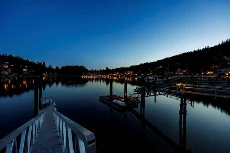 Deep Cove Waterfront Home for Sale with Private Dock and Guest Cottage