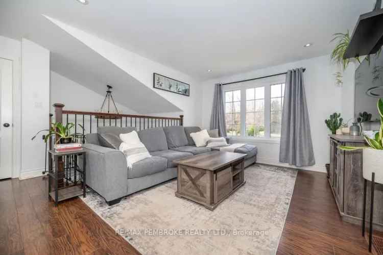 Charming Hi Ranch Home with Modern Finishes and Spacious Deck