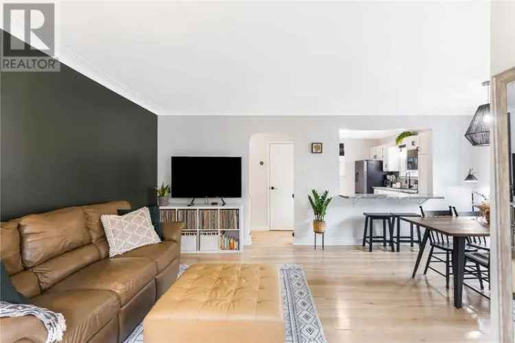 Updated 2+1 Bedroom Home with In-Law Suite and Creekside Backyard