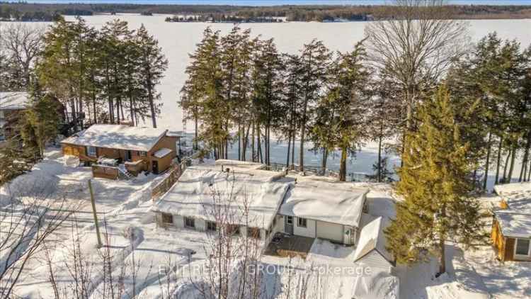 For Sale Waterfront Bungalow with Lake Access and Scenic Views