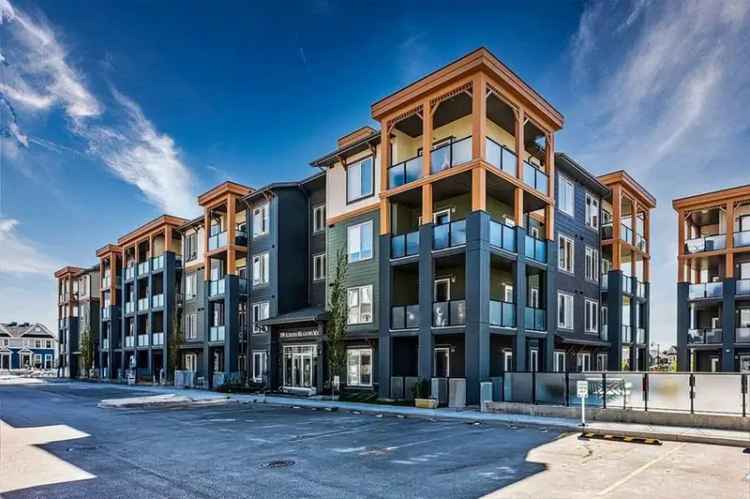 Rent top floor corner unit in Auburn Bay with mountain views and amenities