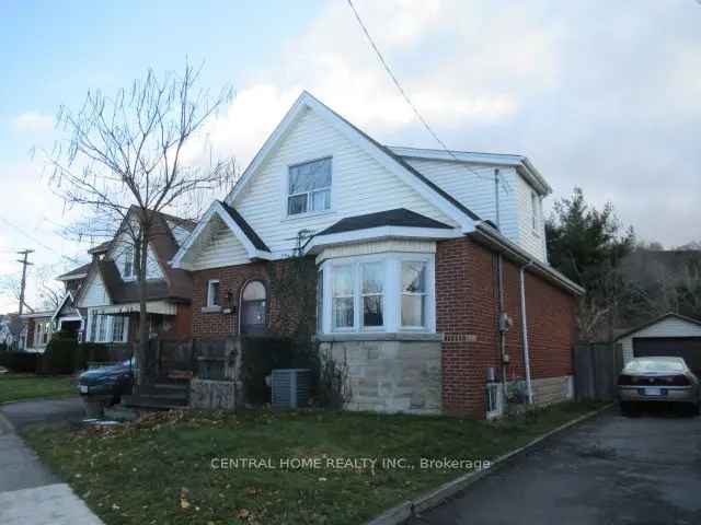 Buy Brick Home with Five Bedrooms in a Family Friendly Neighbourhood