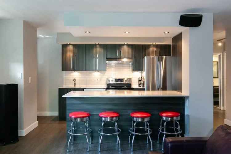 Buy House in Calgary with Renovated Features and Large Balcony