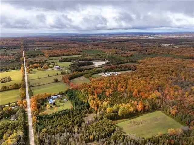 10-Acre Bungalow with 3-Season Sunroom and Detached Shop