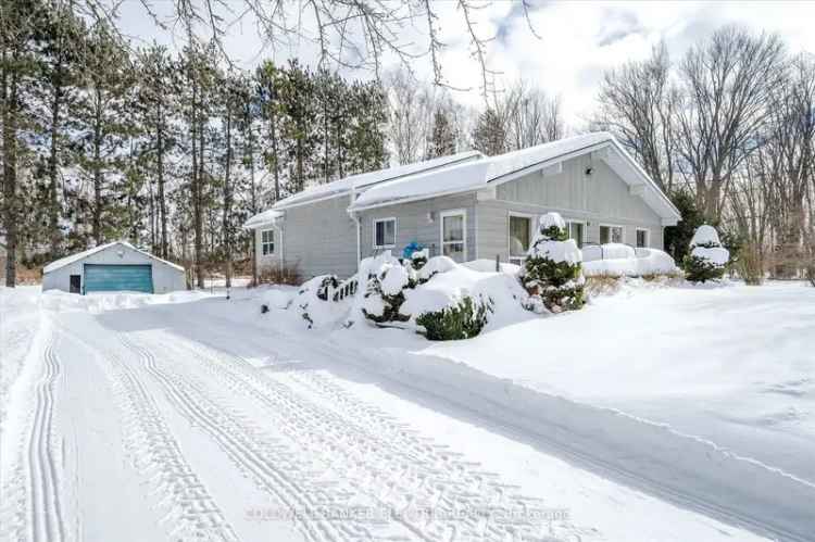 Cozy 2-Bedroom Backsplit with Water Views and Detached Garage