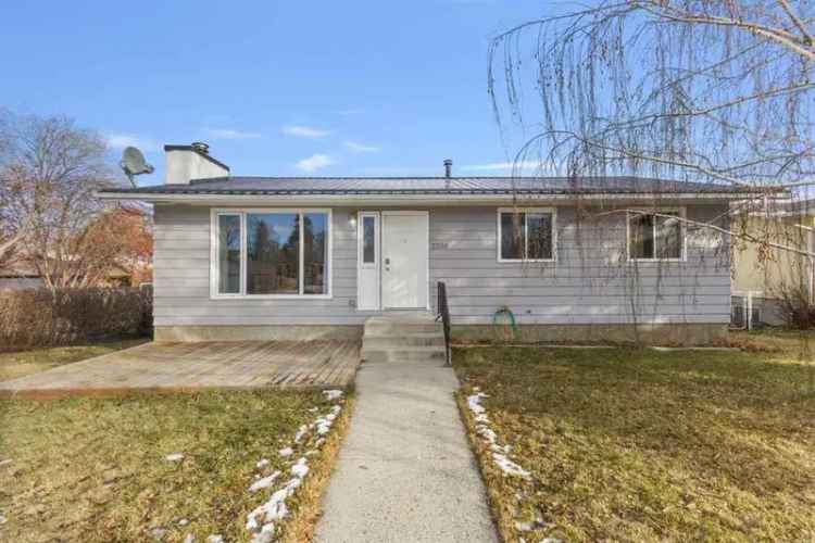 Charming Nanton Bungalow - 4 Bed, Updated Kitchen, Finished Basement