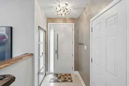 Spacious 4-Bedroom Bungalow with Heated Pool and Low-Maintenance Backyard