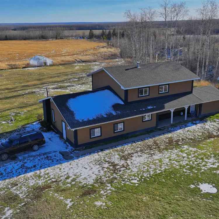 160-Acre Family Home with Shop and Farmland