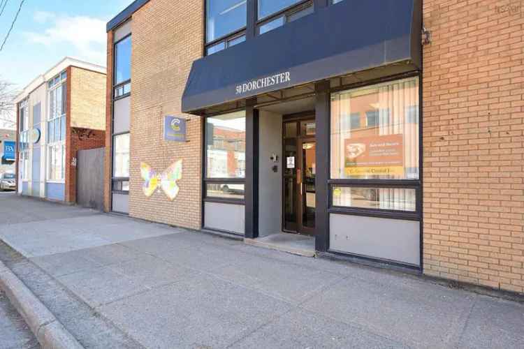 Rare Commercial Real Estate Opportunity: Two Fully Rented Buildings with Ample Parking