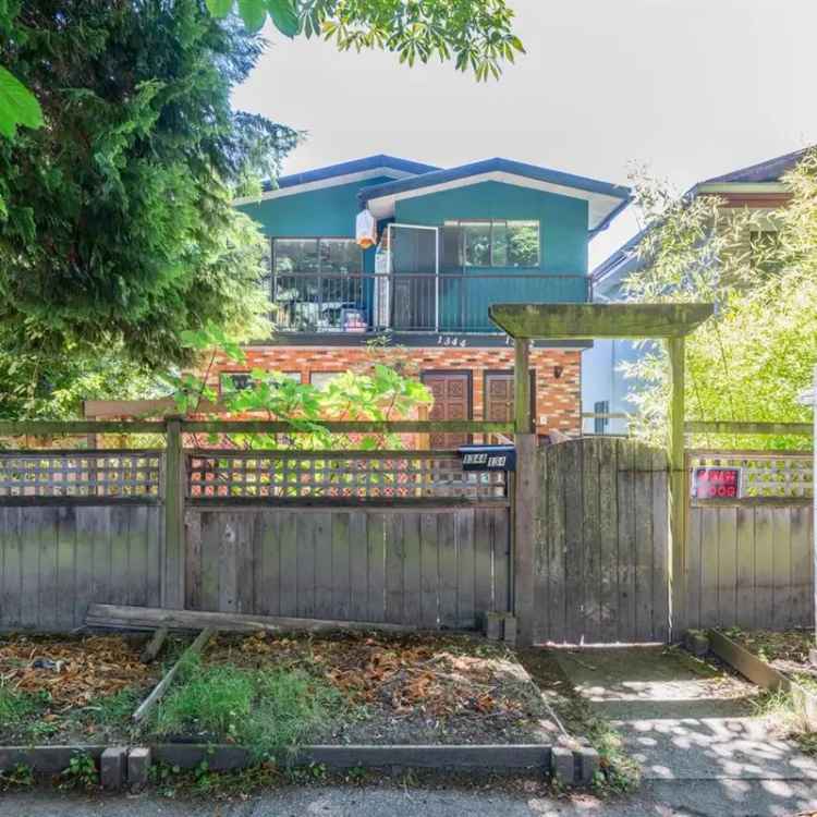 Vancouver Special Duplex near Queen Alexandra Elementary