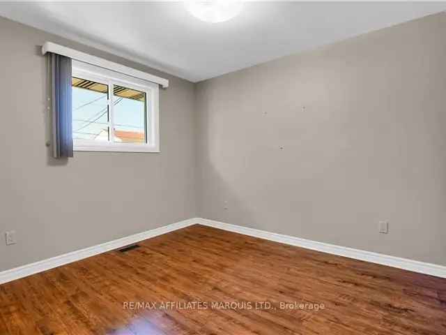 Charming Brick Bungalow with Renovated Main Floor and Spacious Basement