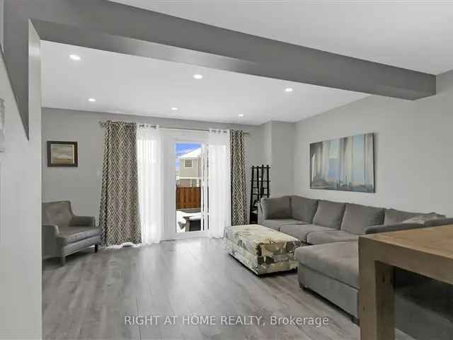 Updated 3-Bed 2-Bath Barrhaven Condo - Finished Basement & Fenced Yard