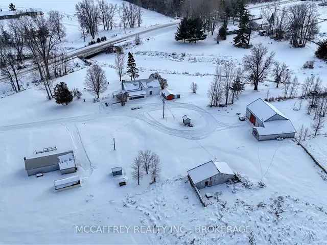 25-Acre Country Homestead Century Home with Barn and Outbuildings