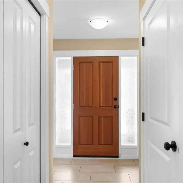 Family Home for Sale: 3 Beds + Den, Legal Suite, Private Yard
