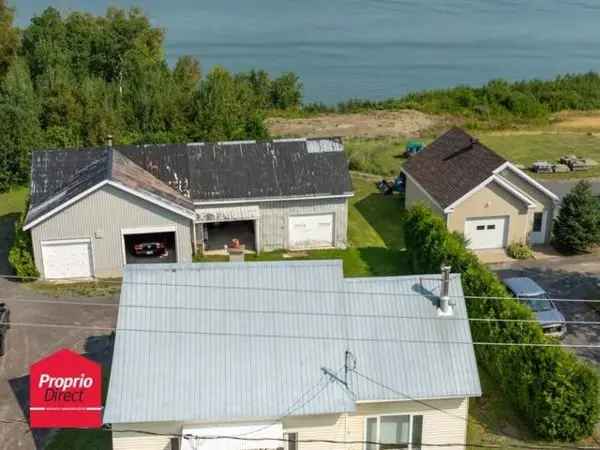 Bungalow for Sale in Charlevoix with Huge Garage and 2 Bedrooms