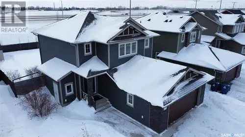 Buy House in Rosewood Saskatoon with Basement Suite and Modern Features