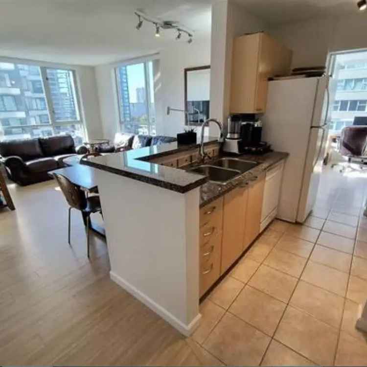 Spacious 1-Bed + Den Condo in Downtown Vancouver The George