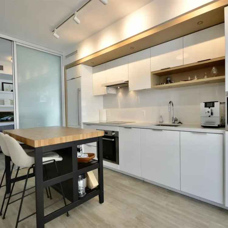 Luxury 2-Bedroom Condo in Olympic Village with City Views