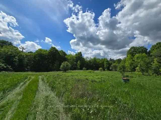 Secluded 8.86 Acre Property with 3-Bedroom Log Home