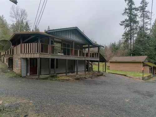 Buy House in Nanaimo with 5 Acre Potential and Outbuildings