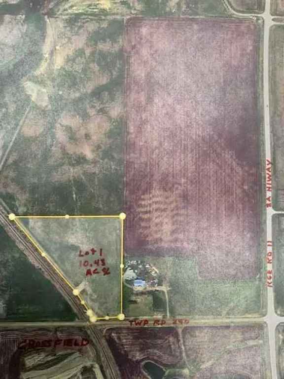 Buy Industrial Heavy Land in Crossfield with Potential for Subdivision