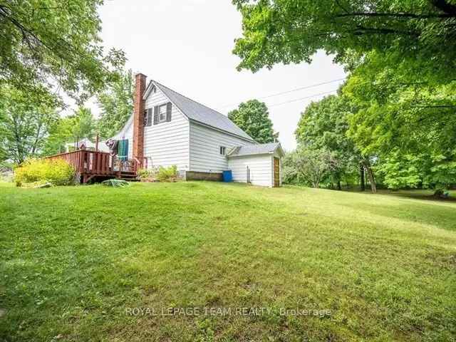 1.5 Acre Homestead with Updated Farmhouse Kitchen and 3 Bedrooms