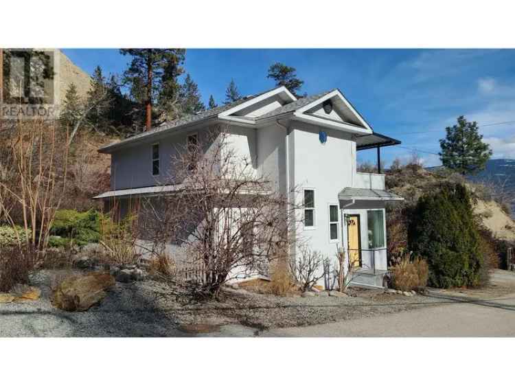 Buy House in Lower Town Summerland with Scenic Outdoor Spaces