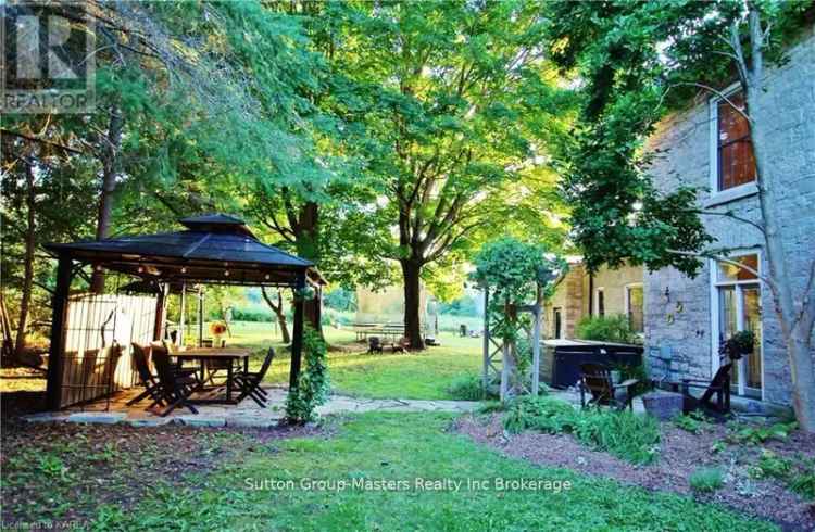 Historic 1850s Home with Modern Amenities and 20 Acres