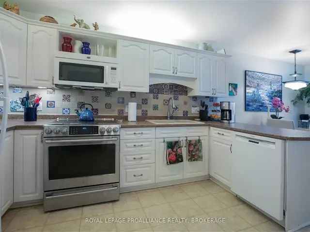 Inviting Bungalow with Gas Fireplaces, Main Floor Living, and Two-Car Garage