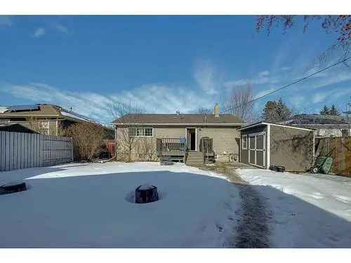 House for Sale in Woodlea Red Deer with Large Backyard and Garage