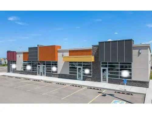 Retail Building For Sale in Calgary with Long Term NNN Lease