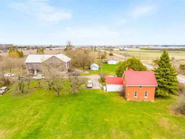 1.5 Story Farmhouse on 71.5 Acres with Barn & Cellular Tower Income