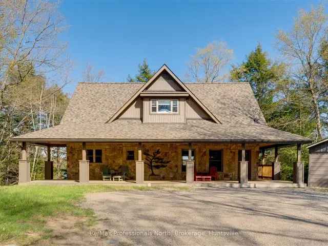 Muskoka Waterfront Cottage: Stone Cladding, Private Shoreline, and Expansive Suite