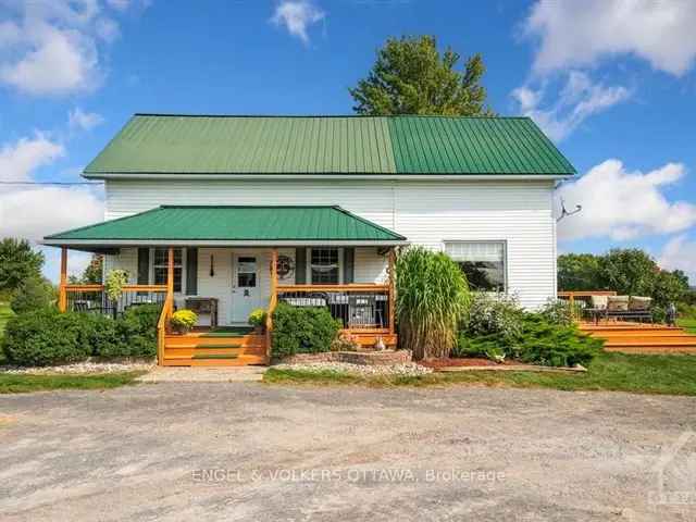 2 Bed 2 Bath Farmhouse on 34 Acres with Barn and Riding Ring