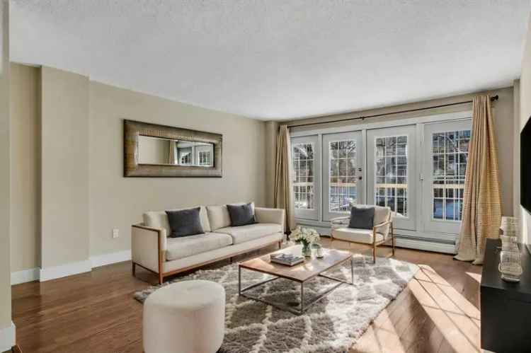 Sunalta Condo: 2 Bed 1 Bath with In-Suite Laundry and Parking